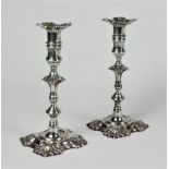 An attractive pair of 18th Century Irish cast silver Candlesticks, Dublin,