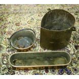 A large Art Nouveau oval shaped copper Coal Bucket, a large copper Fish Kettle, with iron handles,