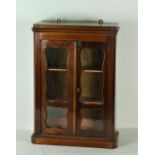 A small Victorian two door mahogany Medicine Wall Cabinet, with two shaped glazed doors,