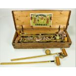 A large "Feltham's Universal Croquet Set," 6 mallets, 6 balls, plus markers etc.