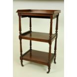 A good quality late Georgian mahogany three tier Whatnot,