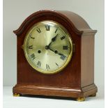 An Edwardian stained oak cased Mantle Clock,