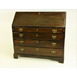 A good Georgian period Irish mahogany sloped front Bureau, with fitted interior,