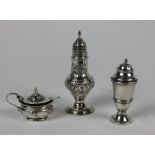 A silver Sugar Castor, London, 1783 ?, makers mark TD, the pierced top with acorn finial,