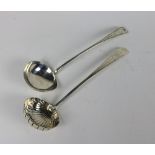 A very good large early Irish silver Soup Ladle, with engraved bright cut handle, and shell bowl, c.