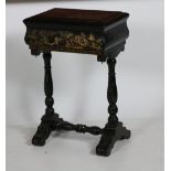 A late Victorian black lacquered Ladies Work Table, decorated in the chinoiserie style,