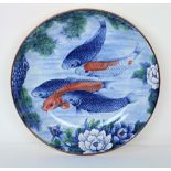 A large modern porcelain Bowl, decorated in the Chinese style with large fish, approx. 37.