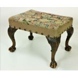 A 19th Century Irish carved walnut Footstool,