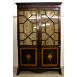 A good 19th Century Sheraton style Wardrobe, with two 13 pane glazed glass doors,