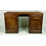 A mahogany framed pedestal Desk, 19th Century, with rectangular top, open recess to the centre,