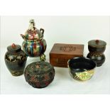 An Oriental glazed Pot Porri Bowl, on three animal legs,