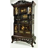 A Japanese carved and lacquered Shodhana Cabinet, Meji period,