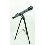 A modern Galileo Telescope, on telescopic stand.