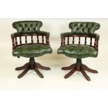 A set of three "Captain Swivel" deep button leather Boardroom or Office Chairs,