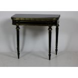 A 19th Century French inlaid and brass mounted ebonised Card Table,