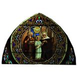 An arched Gothic style stained and leaded glass Panel, of arch form,