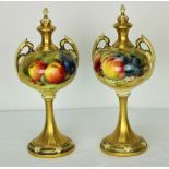 A very fine pair of Royal Worcester Vases and Covers, decorated with fruit,