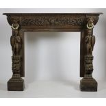 A very ornate carved oak Fireplace, in the Medieval style,