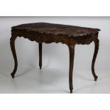 A French carved walnut Centre Table,