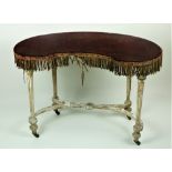A 19th Century kidney shaped giltwood Dressing Table,
