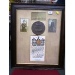 GLAZED AND FRAMED MEMORIAL PLAQUE WITH ORIGINAL PHOTOGRAPHS AND CERTIFICATE NAMED TO A.B. GEORGE