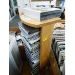 CD RACK WITH ASSORTED CDS INCLUDING METALLICA, STATUS QUO, BRUCE SPRINGSTEEN ETC