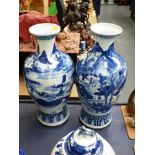 PAIR OF ORIENTAL BLUE AND WHITE VASES H: 17.5"