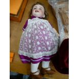 BISQUE HEADED DOLL MARKED S.F.B.J, PARIS 11, MODEL 236 LENGTH 23" FULLY JOINTED ARMS AND LEGS