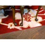 RED AND CREAM RUG 73" X 53"