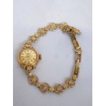 9K GOLD ACCURIST LADIES WATCH TOTAL W: 12G, APPROX 8G WITHOUT WORKINGS