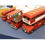 3 LARGE SCALE BUSES AND A LARGE SCALE FIRE TRUCK