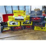 4 BOXED MAISTO SPORTSCARS AND 5 BOXED COLLEZIONE FERRARIS