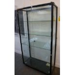 GLASS DISPLAY CABINET ON WHEELS