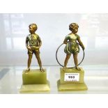 FERDINAND PREISS (1882-1943) - PAIR OF COLD PAINTED AND GILT PATINATED BRONZES - HOOP GIRL AND SONNY