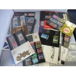 25 ASSORTED MINT STAMP SETS