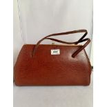 Exemplar brown leather handbag