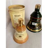 1 boxed and sealed Bells Extra Special Old Scotch Whisky small decanter and 1 sealed Bells Finest