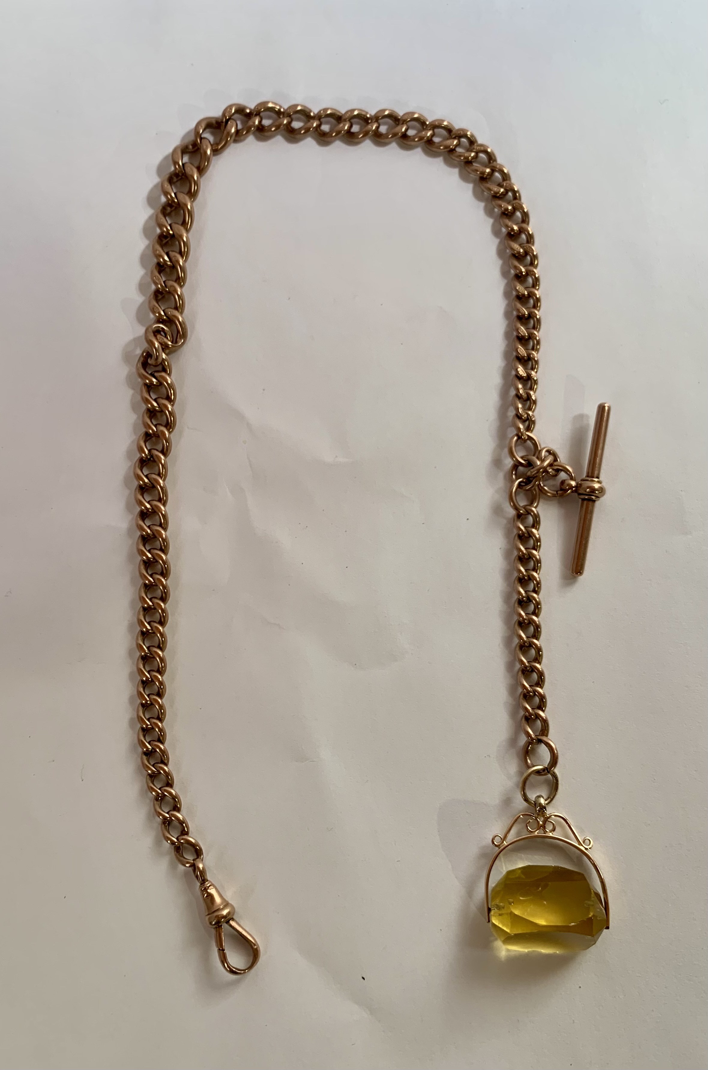 9k gold link necklace with bar and yellow stone fob pendant, total weight 63.37 grams, length of