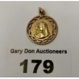 18k gold pendant with figure of Mary, w: 2.07 grams, 0.75” diameter