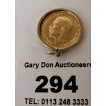 1913 half sovereign in 9k gold holder, 4.99 grams
