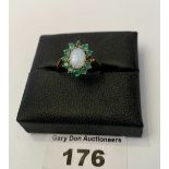 9k gold ring with opal and green stones, w: 1.92 grams, size N