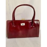 Ackery burgundy patent leather handbag