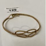 9k gold twist bangle, w: 10.8 grams