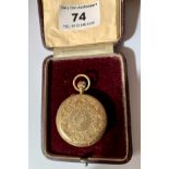 18k gold embossed fob watch in original case, total w: 36.32 grams, 1.5” diameter, not working