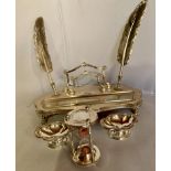 Silver plated inkwell stand with 2 plated feather pens, 2 small plated salts and plated egg timer