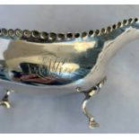 Silver cream jug, w: 5 ozt, 7” long, engraved initials