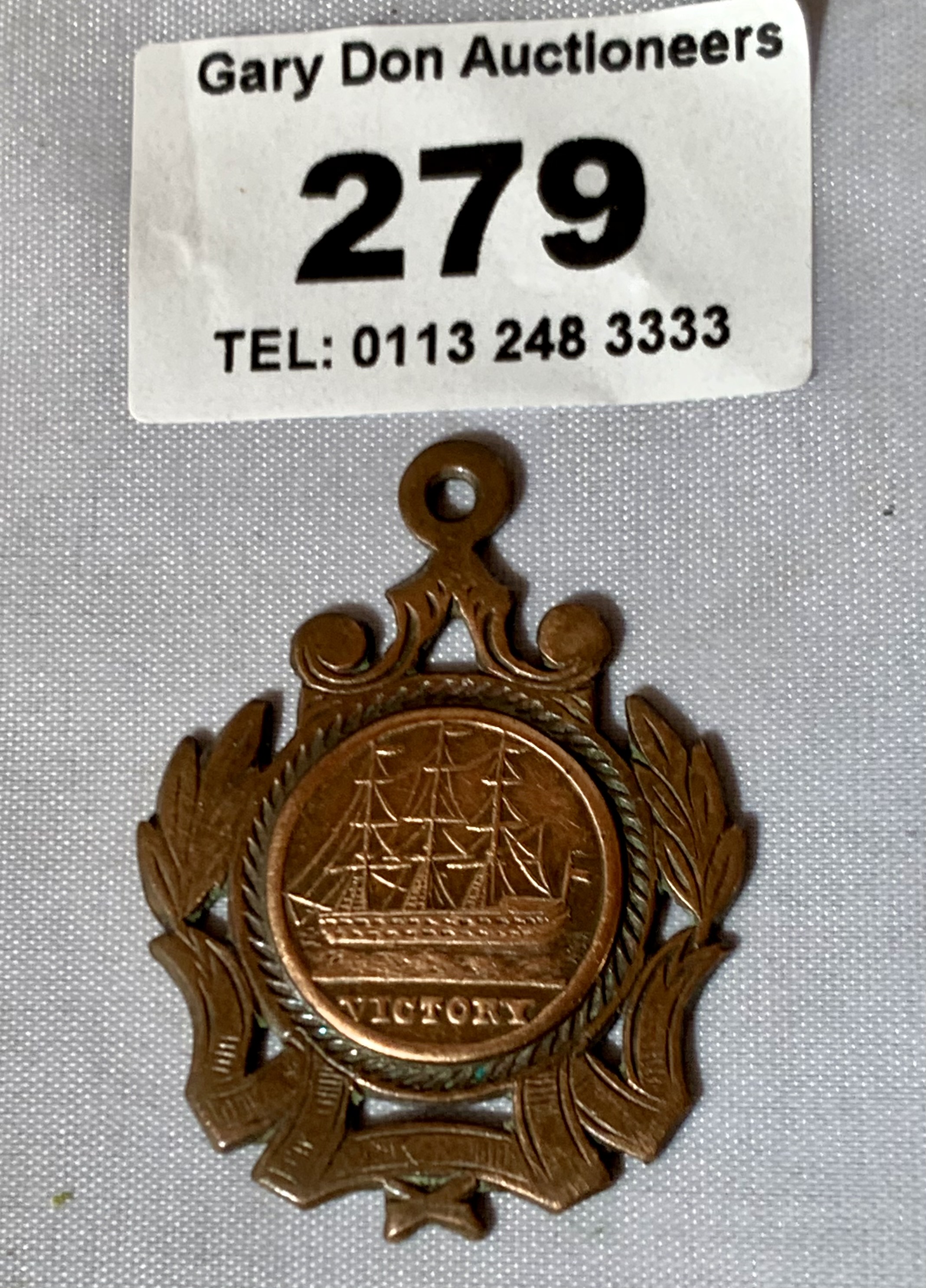 Commemorative medallion from BFSS Nelson Centenary containing Victory copper, E.R VII