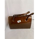 Ackery bronze leather patent handbag