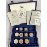 Cased part set of The Historic Coins of Great Britain with 22 coins, certificates and 2 empty cases
