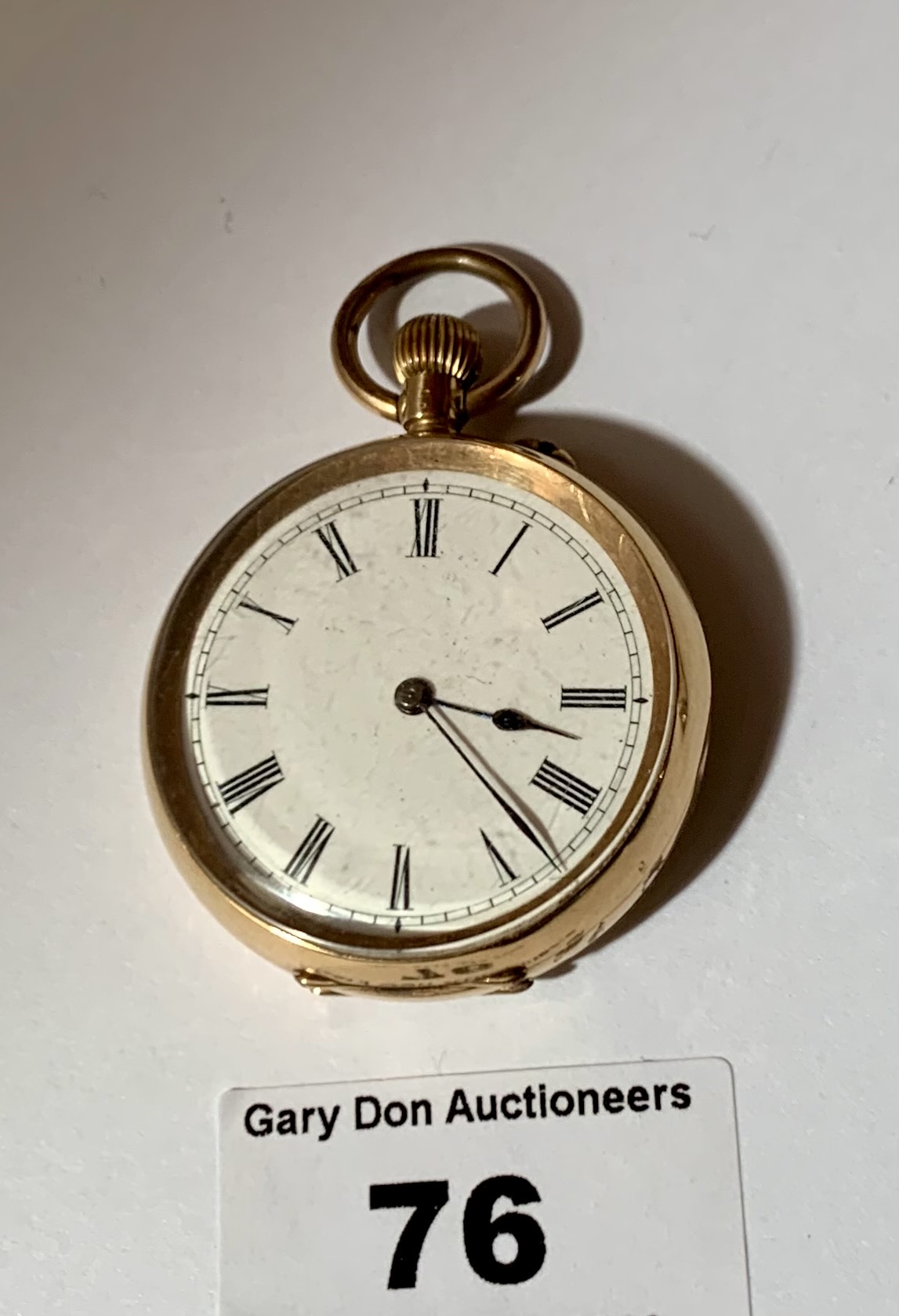 14k gold embossed fob watch , total w: 44.16 grams, 1.5” diameter, working